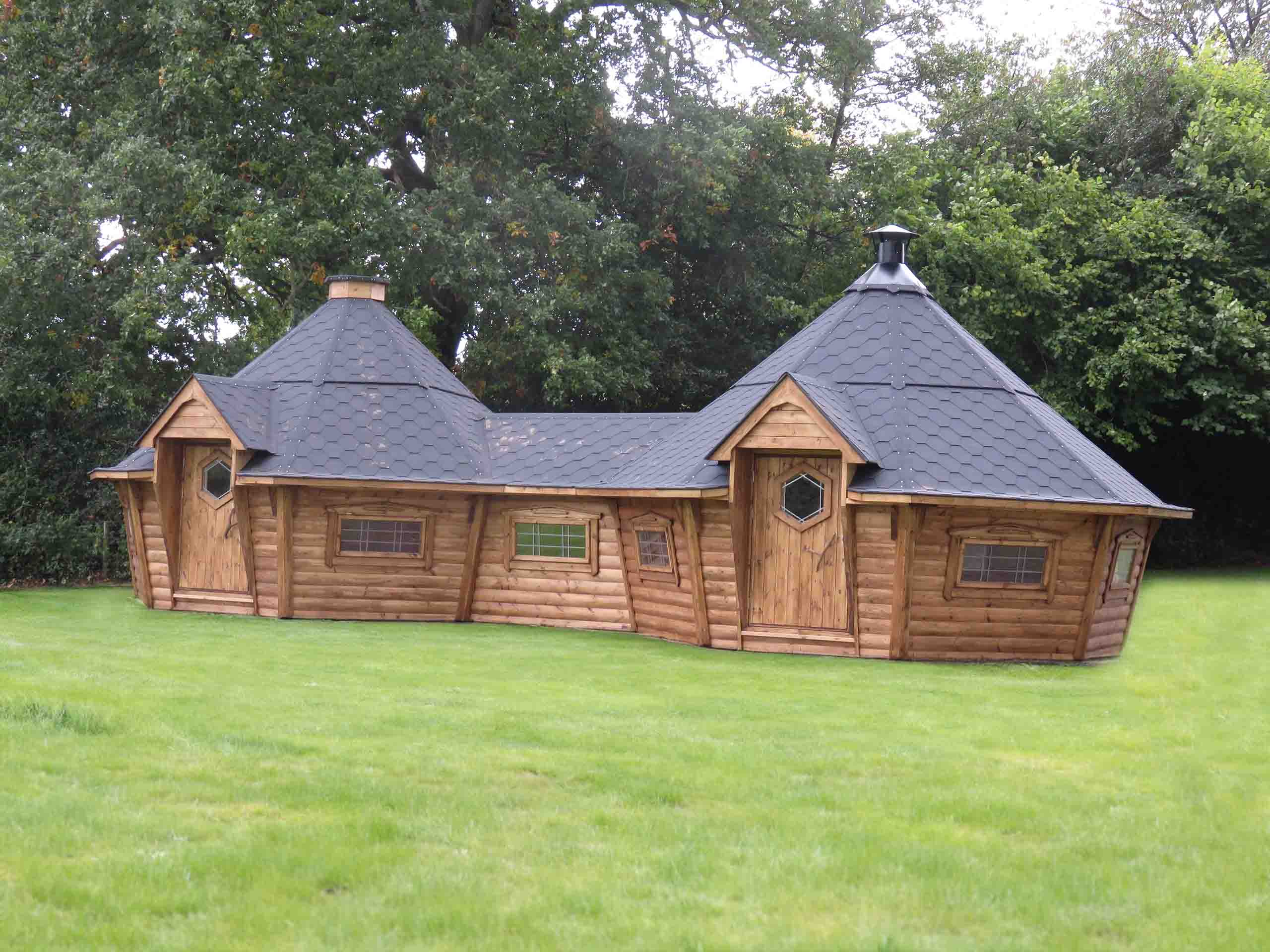 two barbecue cabins joined together